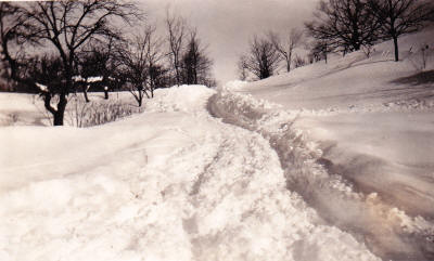 In winter, house at left